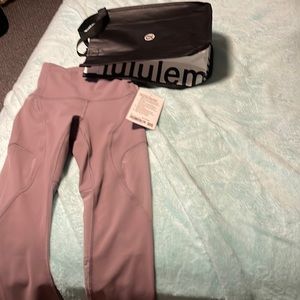 Brand new with tags and bag Lululemon gorgeous workout pants size 0!